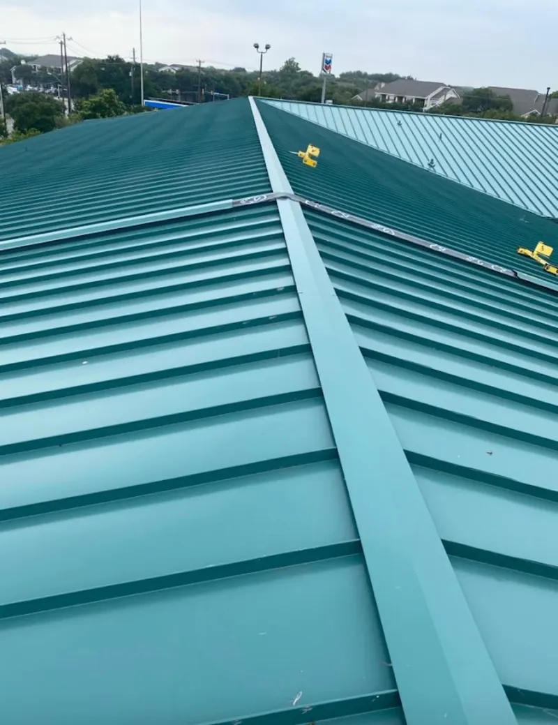 Green commercial metal roof ridge and valley for Metal Roof Repair in Alafaya